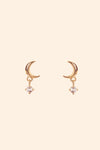 Front view of 14k gold vermeil Crescent Moon Studs, featuring a gold crescent moon and diamond drop, styled for a curated ear stack from the Celestial collection by LIRAE.