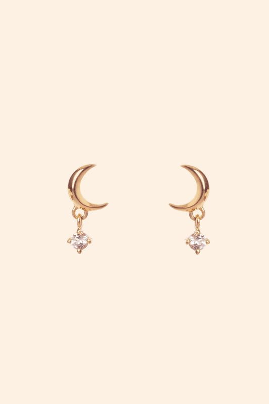 Front view of 14k gold vermeil Crescent Moon Studs, featuring a gold crescent moon and diamond drop, styled for a curated ear stack from the Celestial collection by LIRAE.