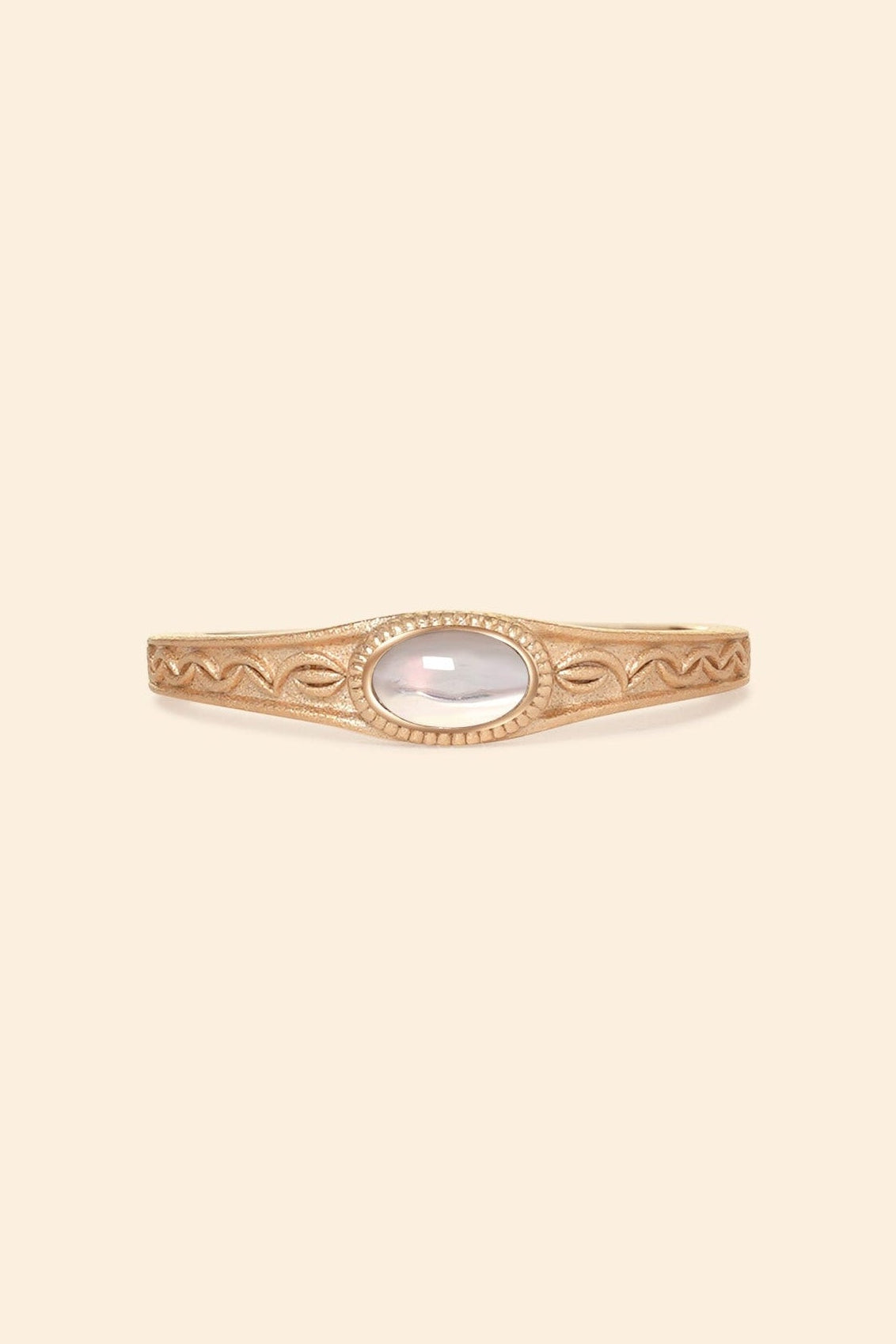 Vintage-style 14k gold plated ring with intricate wave scroll engravings and an oval opal cabochon, handcrafted ancient relic jewelry by LIRAE.