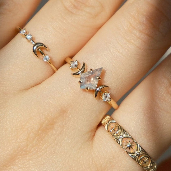 Hand-made 14k gold star band with Crescent Moon and North Star motifs, celestial-inspired wedding or stacking ring by LIRAE.