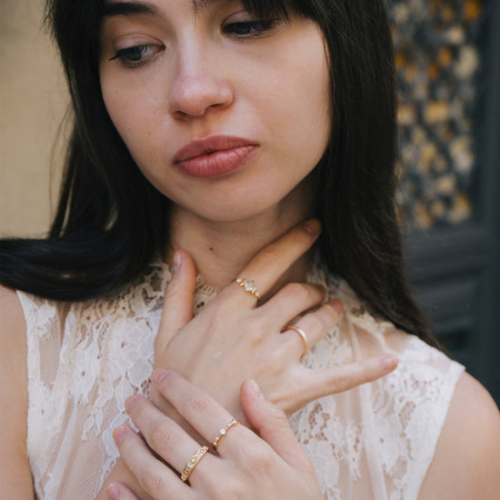Hand-made 14k gold star band with Crescent Moon and North Star motifs, celestial-inspired wedding or stacking ring by LIRAE.