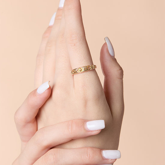 Hand-made 14k gold star band with Crescent Moon and North Star motifs, celestial-inspired wedding or stacking ring by LIRAE.
