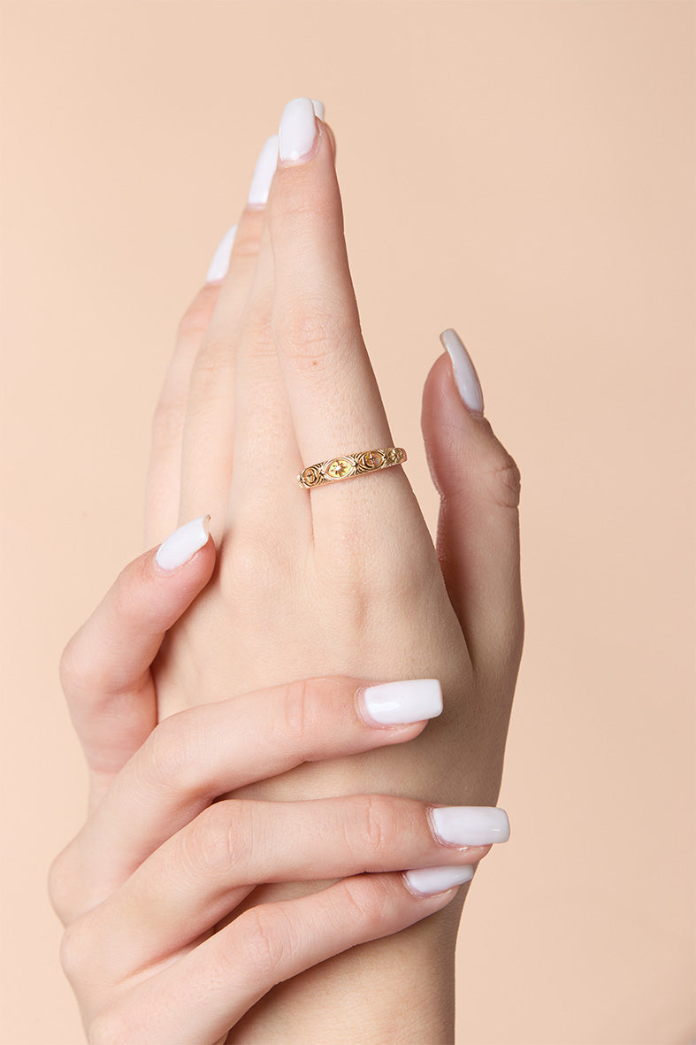 Hand-made 14k gold star band with Crescent Moon and North Star motifs, celestial-inspired wedding or stacking ring by LIRAE.
