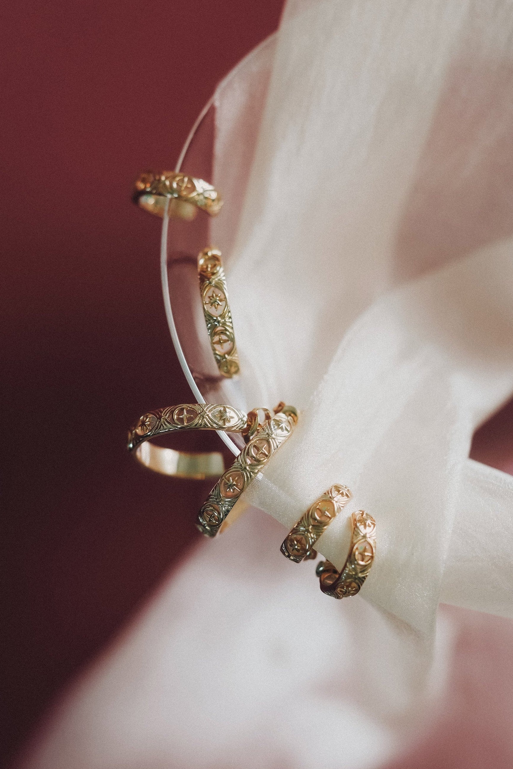 Hand-made 14k gold star band with Crescent Moon and North Star motifs, celestial-inspired wedding or stacking ring by LIRAE.