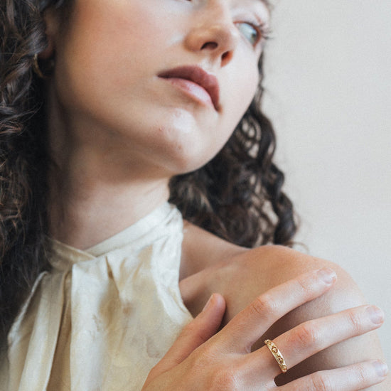 Hand-made 14k gold star band with Crescent Moon and North Star motifs, celestial-inspired wedding or stacking ring by LIRAE.