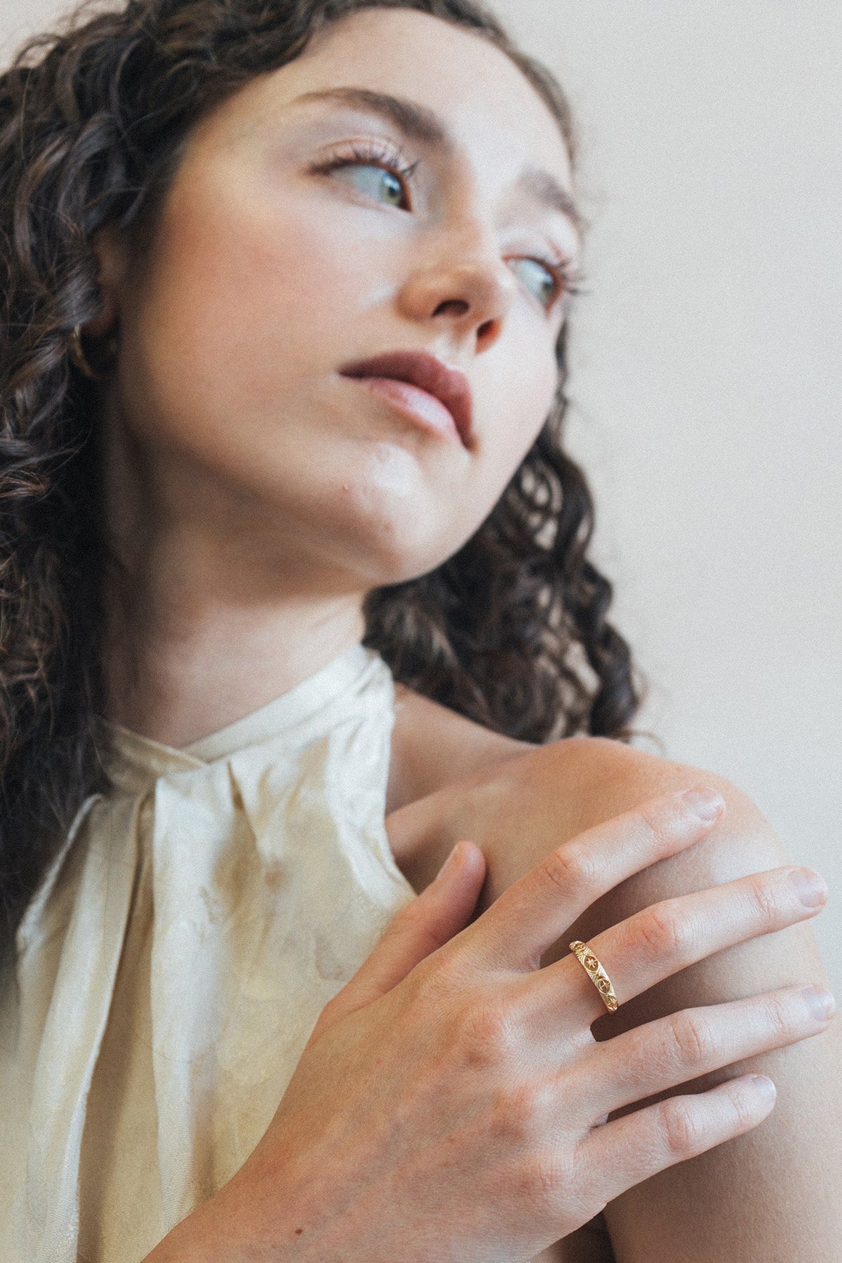 Hand-made 14k gold star band with Crescent Moon and North Star motifs, celestial-inspired wedding or stacking ring by LIRAE.