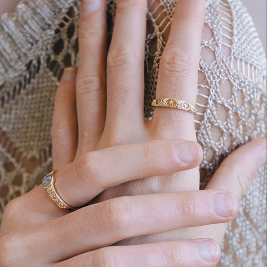 Hand-made 14k gold star band with Crescent Moon and North Star motifs, celestial-inspired wedding or stacking ring by LIRAE.
