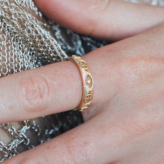 Hand-made 14k gold star band with Crescent Moon and North Star motifs, celestial-inspired wedding or stacking ring by LIRAE.