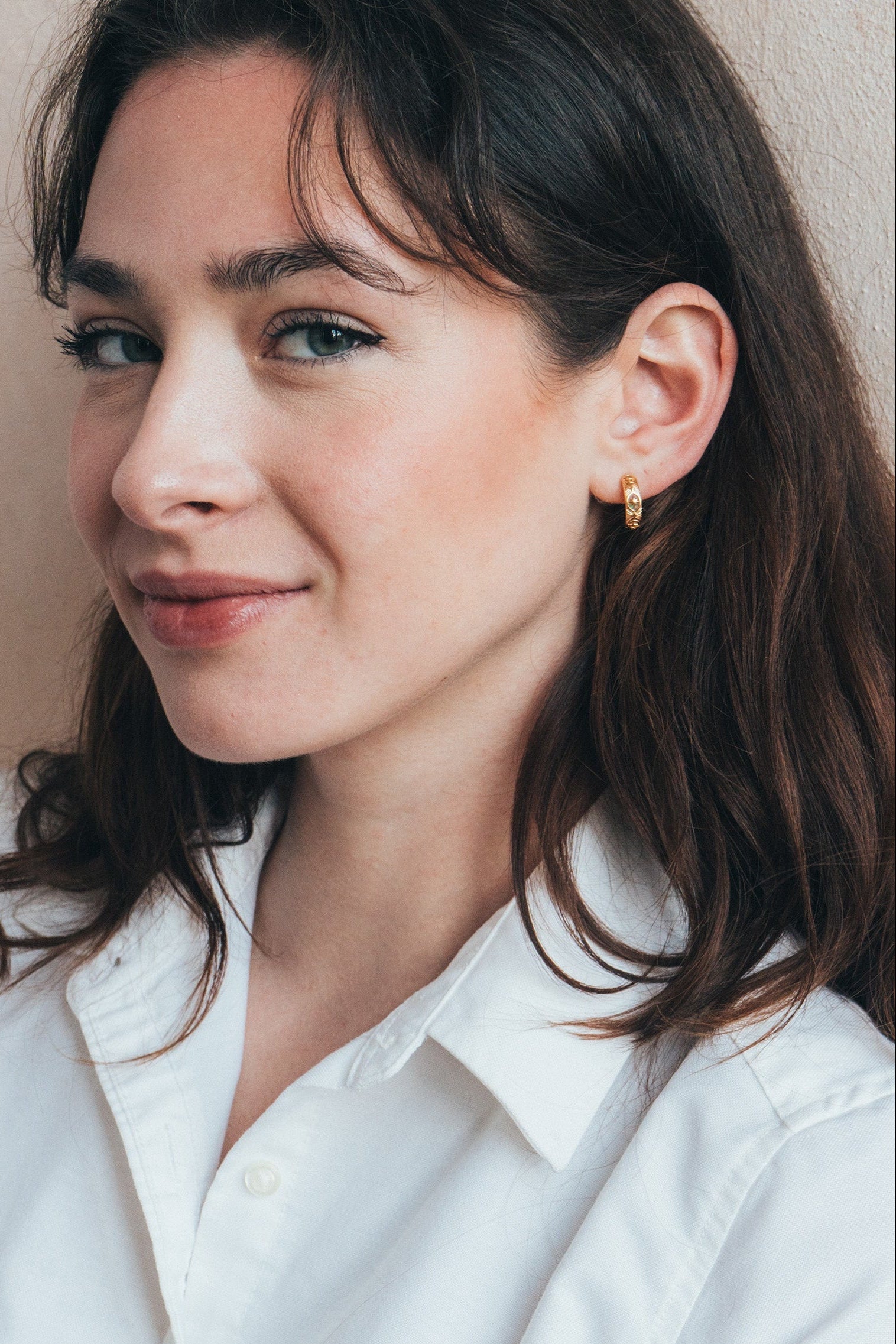 Hand-made gold star hoop earrings with Crescent Moon and North Star motifs, celestial-inspired earrings by LIRAE.