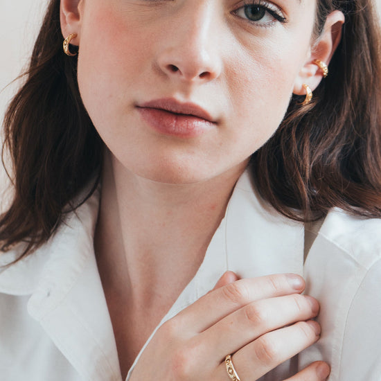 Hand-made 14k gold star band with Crescent Moon and North Star motifs, celestial-inspired wedding or stacking ring by LIRAE.
