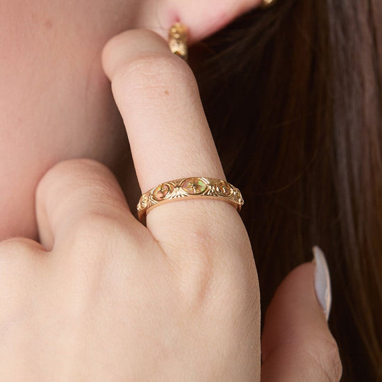 Hand-made 14k gold star band with Crescent Moon and North Star motifs, celestial-inspired wedding or stacking ring by LIRAE.