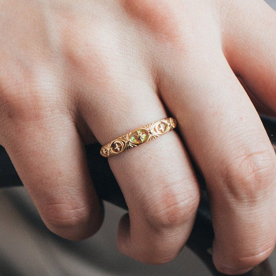 Hand-made 14k gold star band with Crescent Moon and North Star motifs, celestial-inspired wedding or stacking ring by LIRAE.