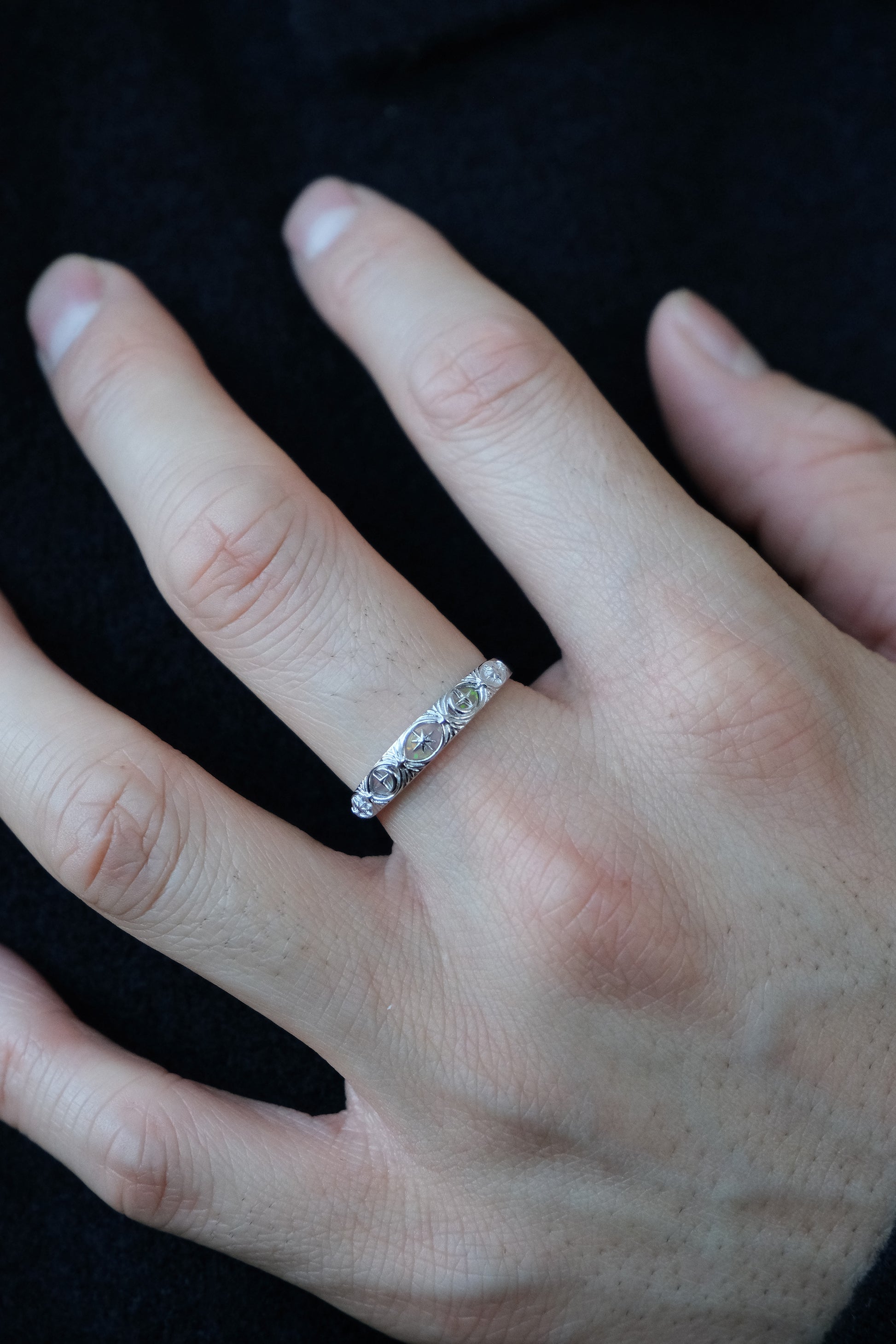Hand-made silver star band with Crescent Moon and North Star motifs, celestial-inspired wedding or stacking ring by LIRAE.