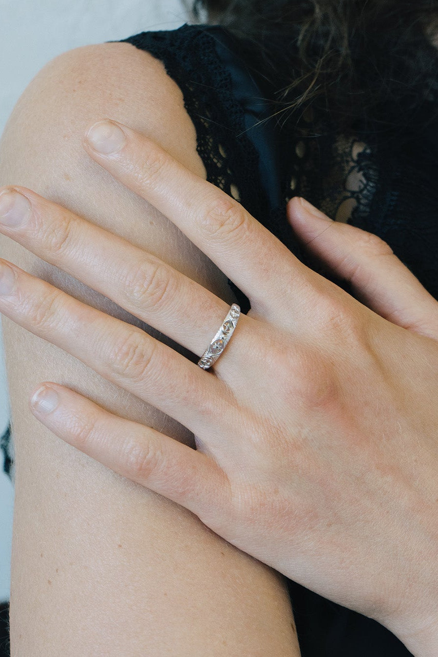 Hand-made silver star band with Crescent Moon and North Star motifs, celestial-inspired wedding or stacking ring by LIRAE.