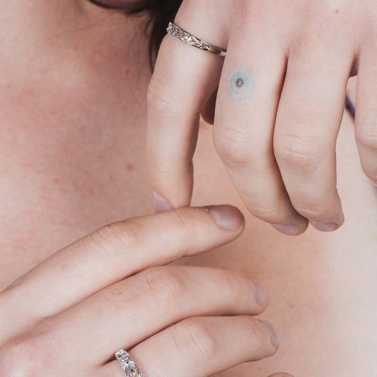 Hand-made silver band with Crescent Moon and North Star motifs, celestial-inspired wedding or stacking ring by LIRAE.