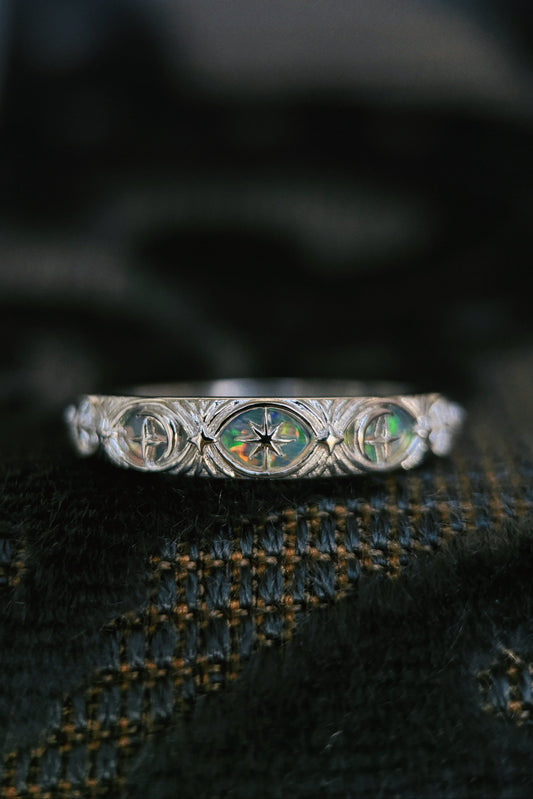 Hand-made silver star band with Crescent Moon and North Star motifs, celestial-inspired wedding or stacking ring by LIRAE.
