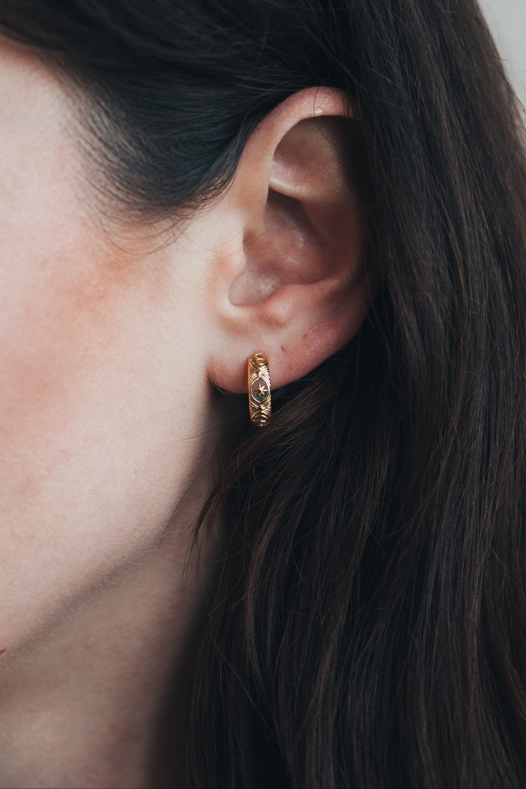 Hand-made gold star hoop earrings with Crescent Moon and North Star motifs, celestial-inspired earrings by LIRAE.