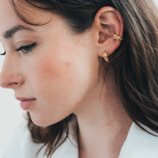 Hand-made gold star hoop earrings with Crescent Moon and North Star motifs, celestial-inspired earrings by LIRAE.
