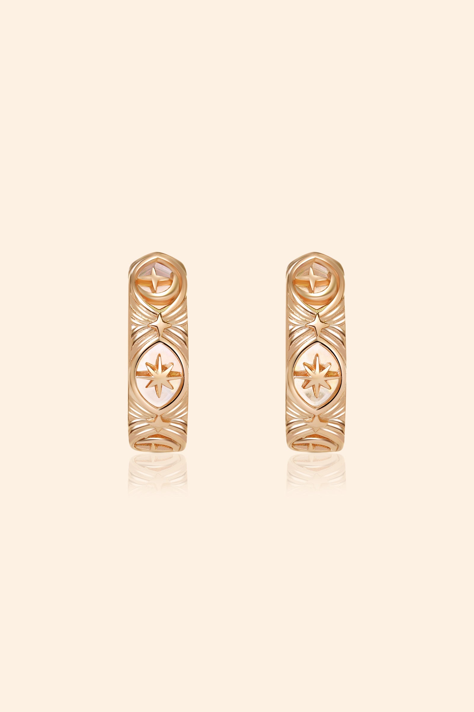 Hand-made gold star hoop earrings with Crescent Moon and North Star motifs, celestial-inspired earrings by LIRAE.