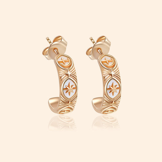 Hand-made gold star hoop earrings with Crescent Moon and North Star motifs, celestial-inspired earrings by LIRAE.