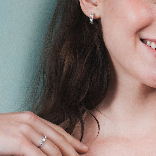 Hand-made silver star band with Crescent Moon and North Star motifs, celestial-inspired wedding or stacking ring by LIRAE.