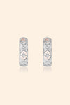 Silver solstice hoop earrings featuring fire opals and celestial starburst engravings by LIRAE.