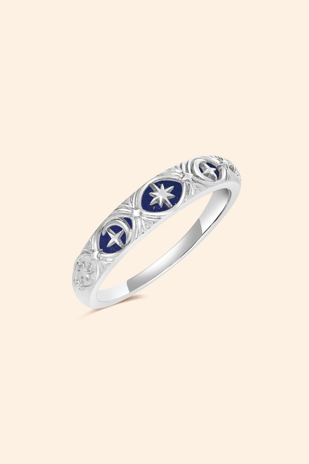 Silver celestial star ring with deep blue lapis lazuli inlay and engraved sun moon details