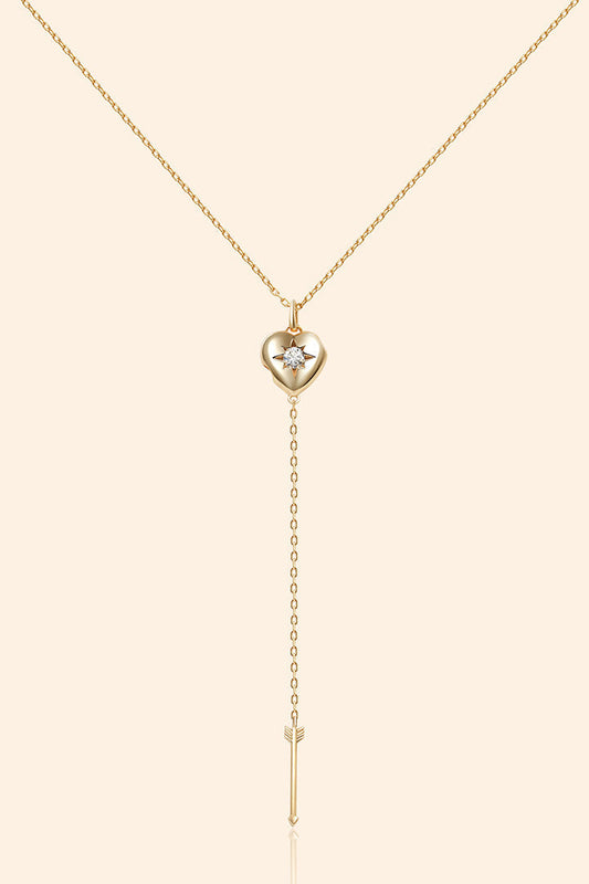Gold heart arrow necklace with removable arrow and sparkling center moissanite stone
