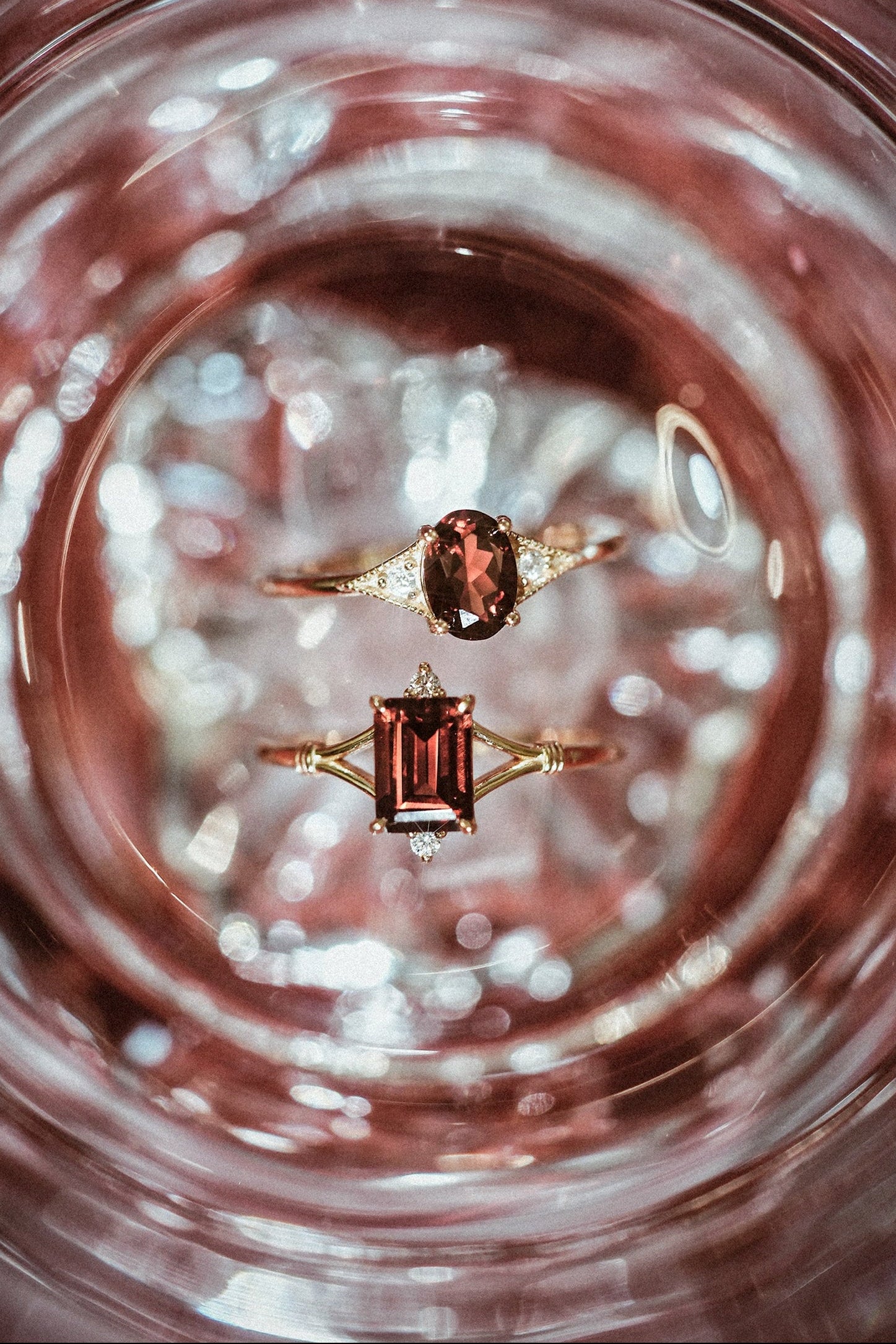 Dainty gold ring with emerald-cut garnet and sparkling moissanite accents