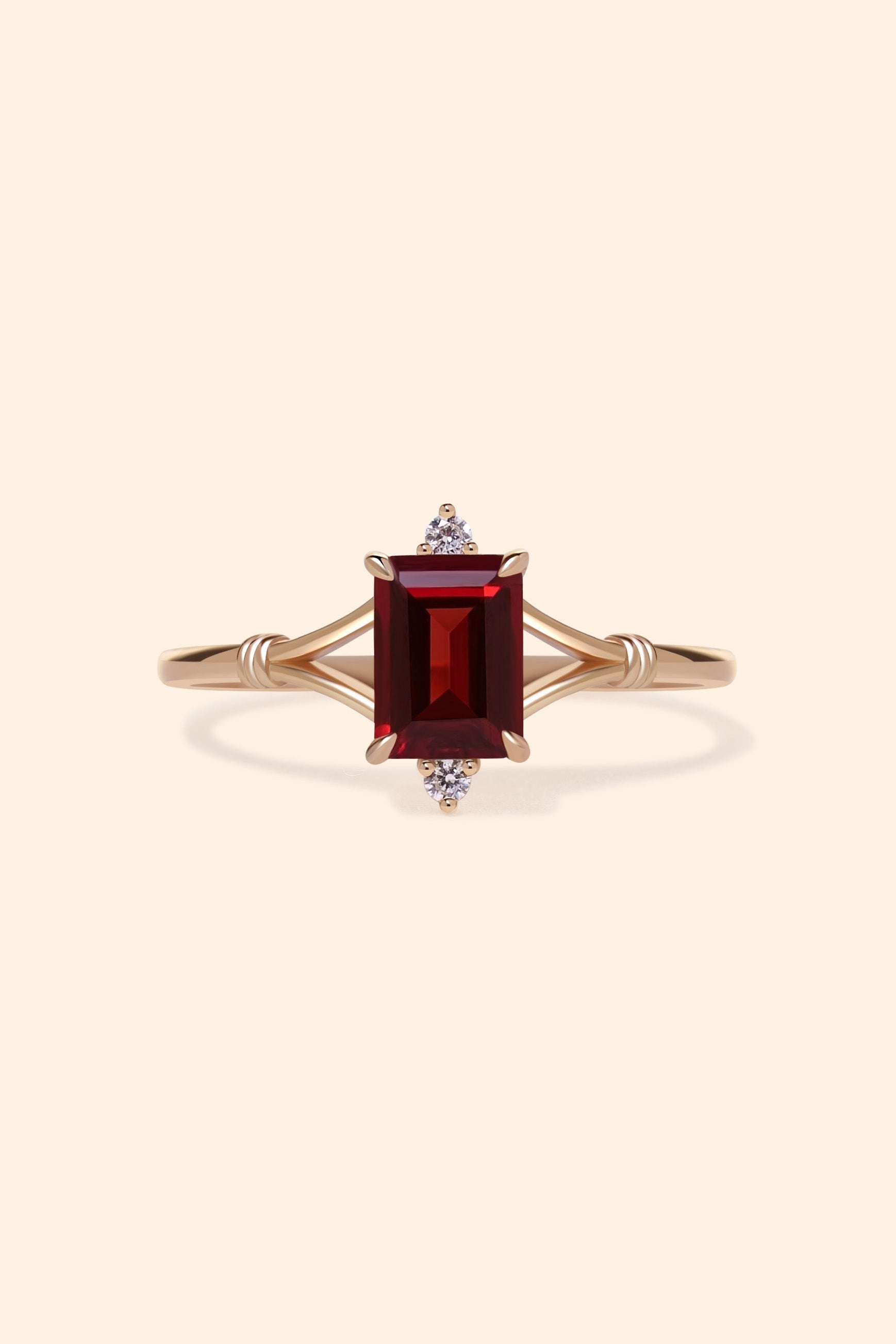 Dainty gold ring with emerald-cut garnet and sparkling moissanite accents