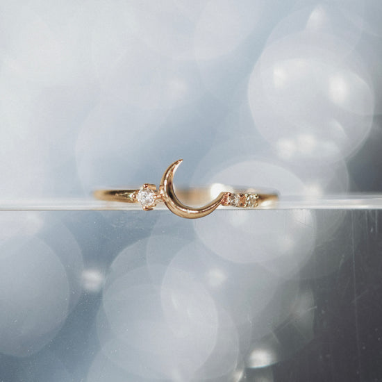 Minimalist crescent moon gold ring with asymmetric diamond accents, 14k gold vermeil 925 silver celestial talisman by LIRAE.