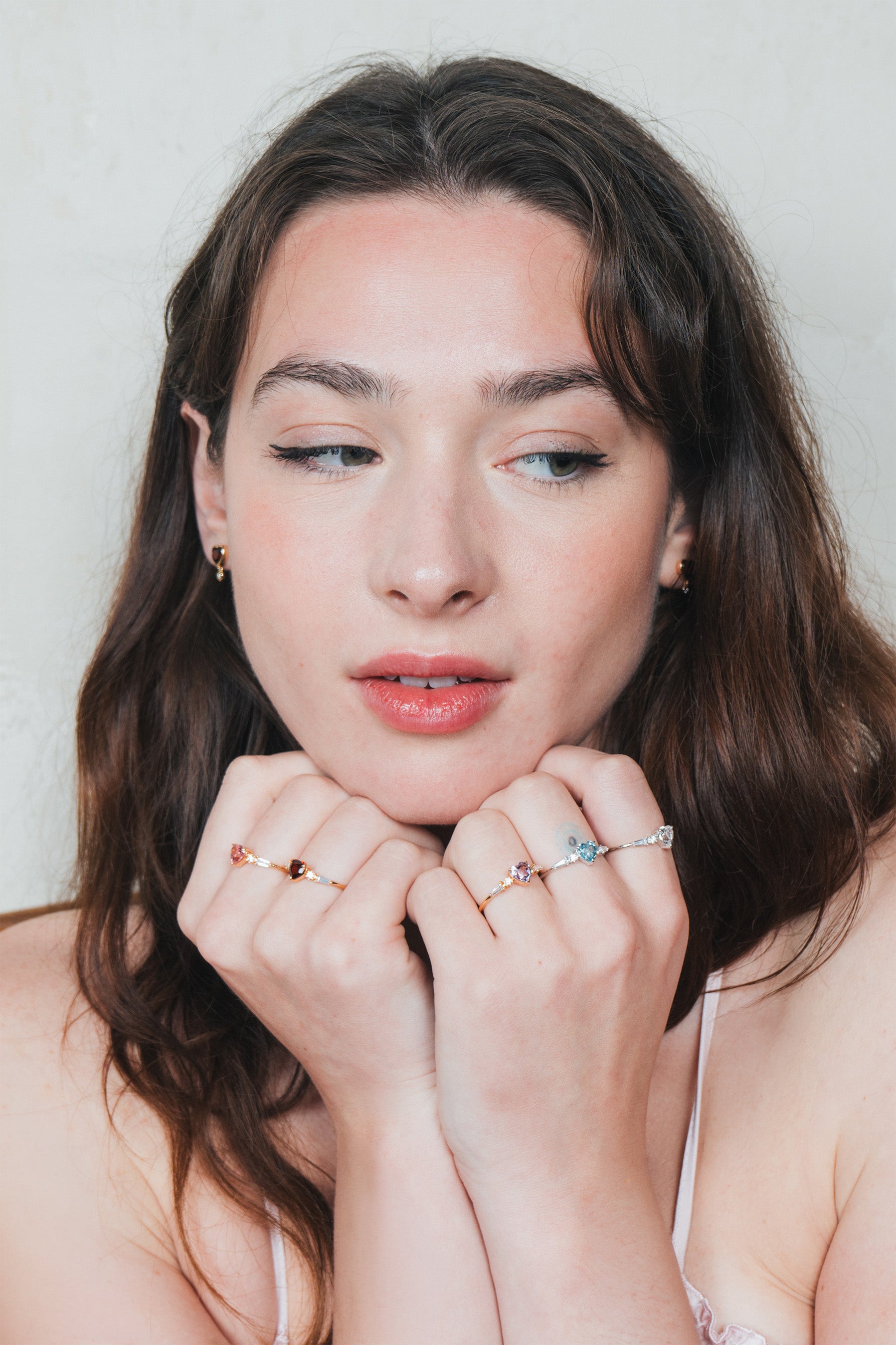 Heart-shaped red garnet ring in gold color with baguette diamond accents, vintage-inspired heirloom jewelry gift for her by LIRAE.