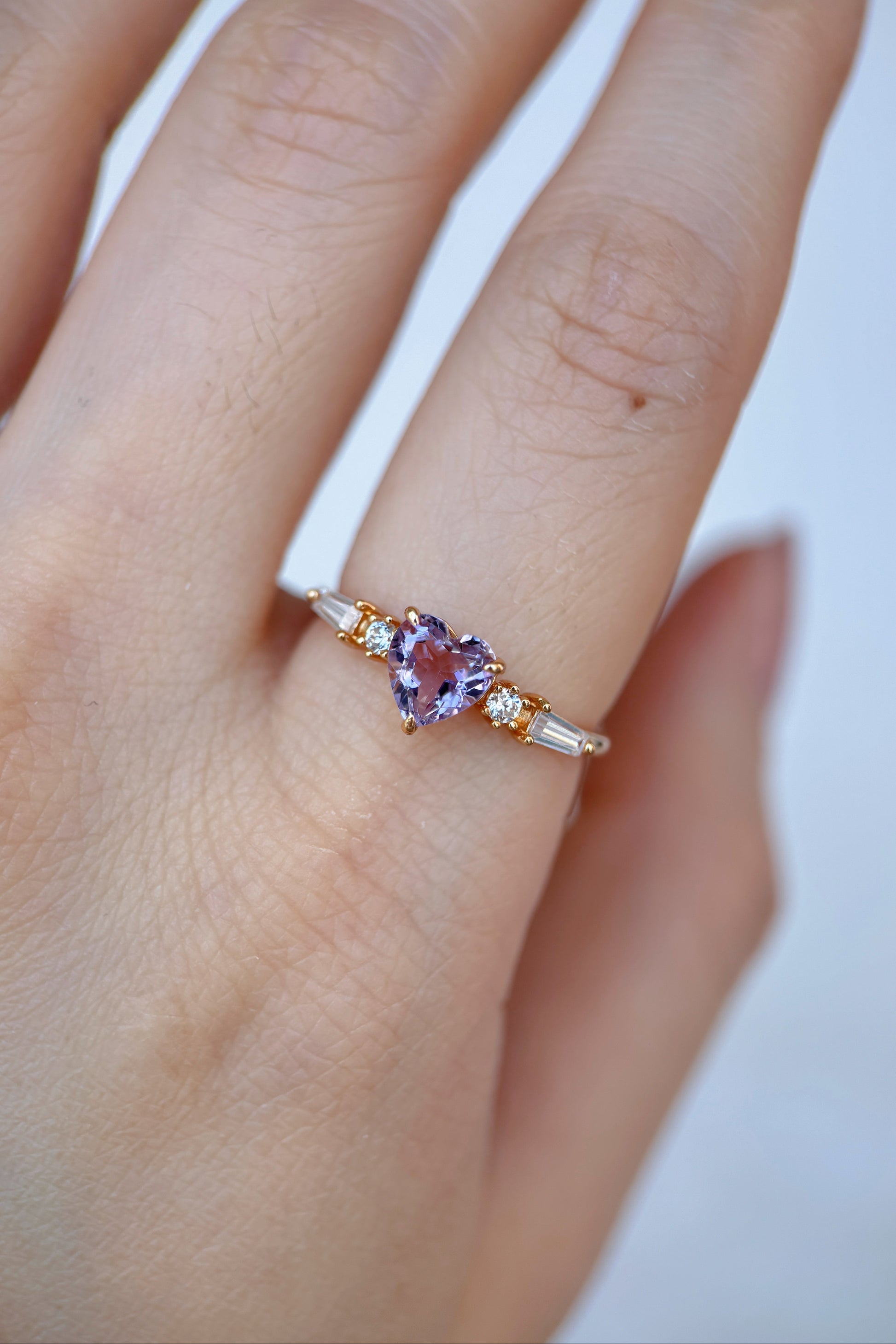 Heart-shaped red garnet ring in 14k gold color with baguette diamond accents, vintage-inspired heirloom jewelry gift for her by LIRAE.
