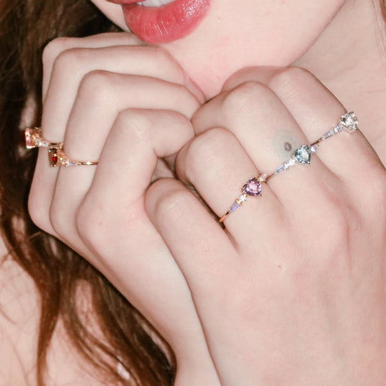 Heart-shaped red garnet ring in gold color with baguette diamond accents, vintage-inspired heirloom jewelry gift for her by LIRAE.