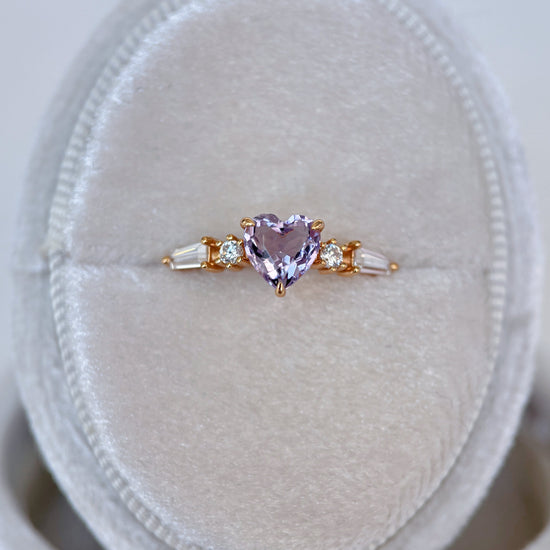 Heart-shaped red garnet ring in 14k gold color with baguette diamond accents, vintage-inspired heirloom jewelry gift for her by LIRAE.