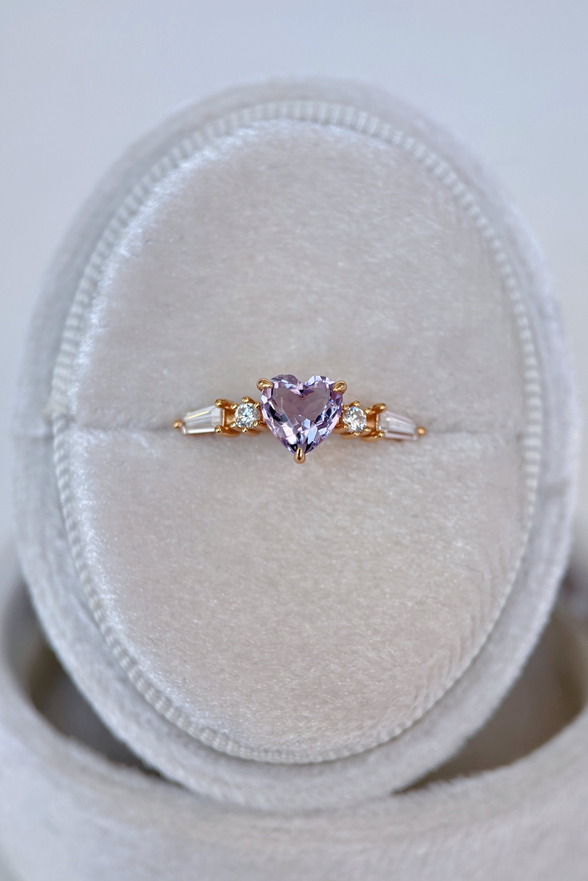 Heart-shaped red garnet ring in 14k gold color with baguette diamond accents, vintage-inspired heirloom jewelry gift for her by LIRAE.