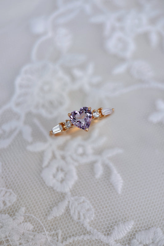 Heart-shaped red garnet ring in 14k gold color with baguette diamond accents, vintage-inspired heirloom jewelry gift for her by LIRAE.