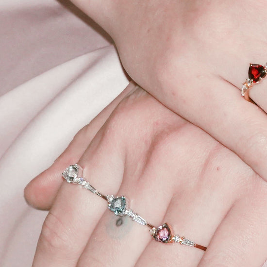 Heart-shaped clear quartz ring in silver color with baguette diamond accents, vintage-inspired heirloom jewelry gift for her by LIRAE.