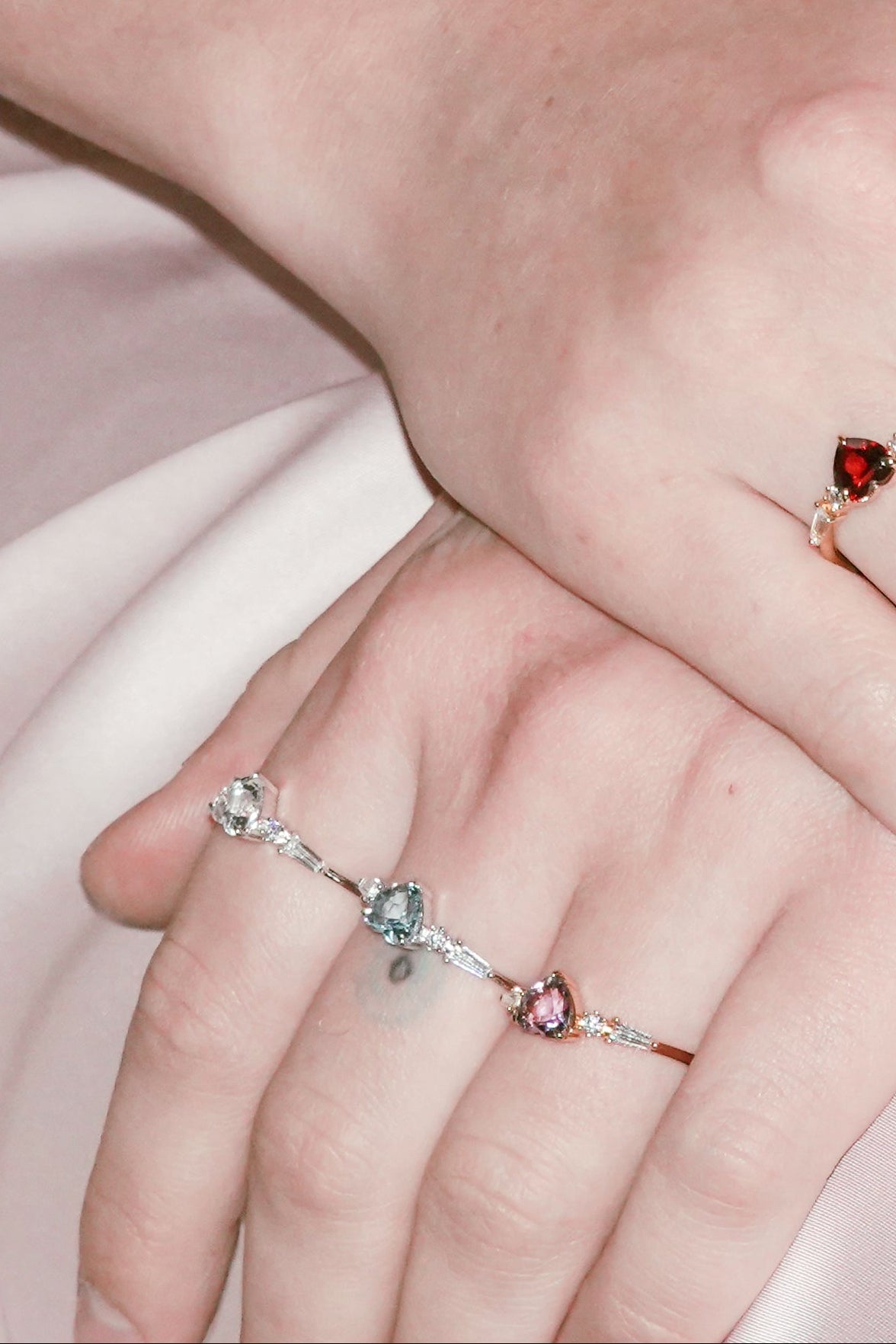 Heart-shaped clear quartz ring in silver color with baguette diamond accents, vintage-inspired heirloom jewelry gift for her by LIRAE.