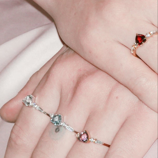 Heart-shaped sky blue topaz ring in silver with baguette diamond accents, vintage-inspired heirloom jewelry gift for her by LIRAE.