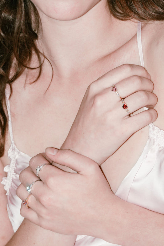 Heart-shaped red garnet ring in 14k gold color with baguette diamond accents, vintage-inspired heirloom jewelry gift for her by LIRAE.