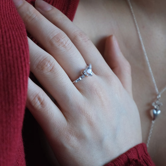 Heart-shaped clear quartz ring in silver color with baguette diamond accents, vintage-inspired heirloom jewelry gift for her by LIRAE.