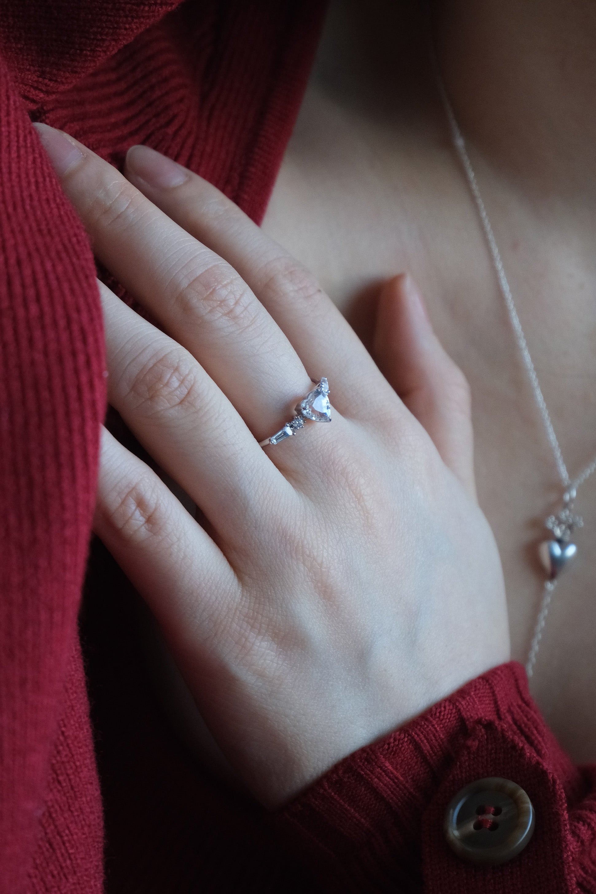 Heart-shaped clear quartz ring in silver color with baguette diamond accents, vintage-inspired heirloom jewelry gift for her by LIRAE.