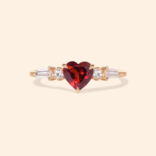 Heart-shaped red garnet ring in 14k gold color with baguette diamond accents, vintage-inspired heirloom jewelry gift for her by LIRAE.