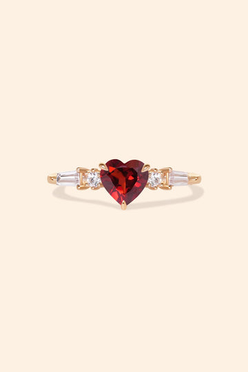 Heart-shaped red garnet ring in 14k gold color with baguette diamond accents, vintage-inspired heirloom jewelry gift for her by LIRAE.