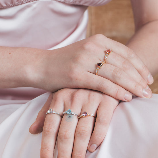 Heart-shaped sky blue topaz ring in silver with baguette diamond accents, vintage-inspired heirloom jewelry gift for her by LIRAE.