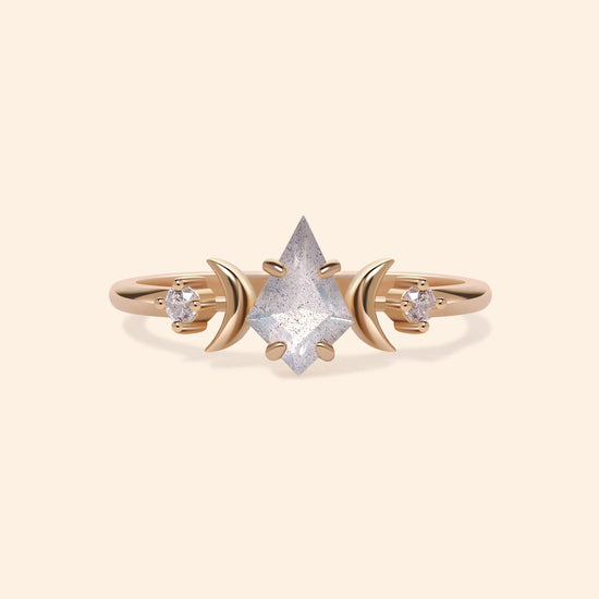 LIRAE celestial ring featuring a kite cut labradorite center stone and gold crescent moons, witchy aesthetic galaxy jewelry for women.