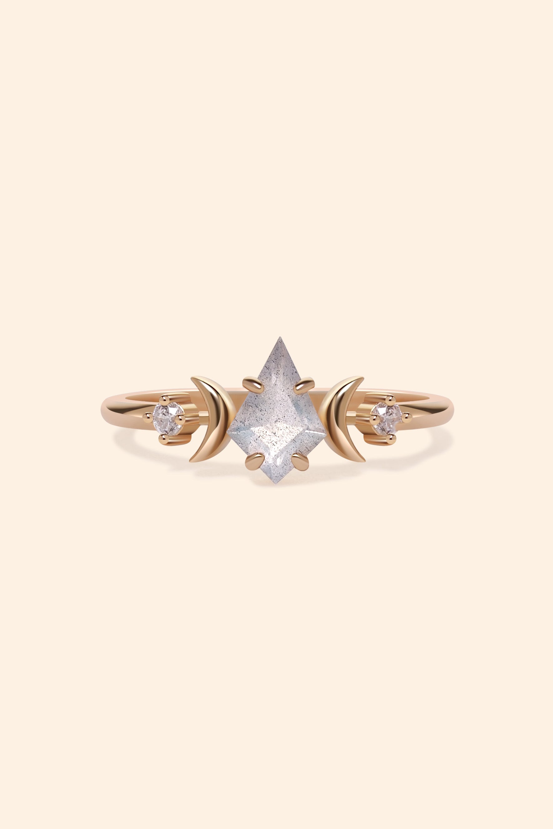 LIRAE celestial ring featuring a kite cut labradorite center stone and gold crescent moons, witchy aesthetic galaxy jewelry for women.
