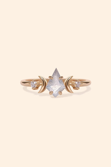 LIRAE celestial ring featuring a kite cut labradorite center stone and gold crescent moons, witchy aesthetic galaxy jewelry for women.