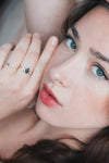 LIRAE celestial ring featuring a kite cut sandstone center stone and gold crescent moons, witchy aesthetic galaxy jewelry for women.